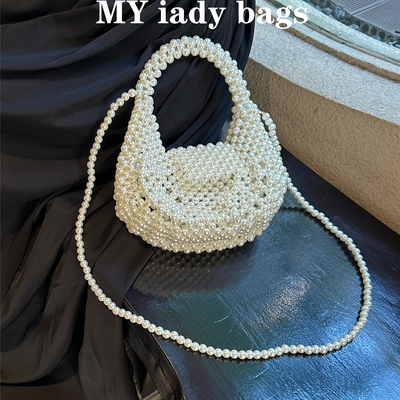 2025新法式轻奢手工串珠编织炫彩珍珠饺子枕头云朵手拿斜挎小包包