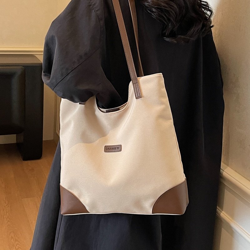 质感复古帆布包包女大容量学生上课通勤包小众百搭单肩腋下托特包,箱包皮具/热销女包/男包,托特包,淘宝优惠券,粉丝福利购,淘宝优惠卷