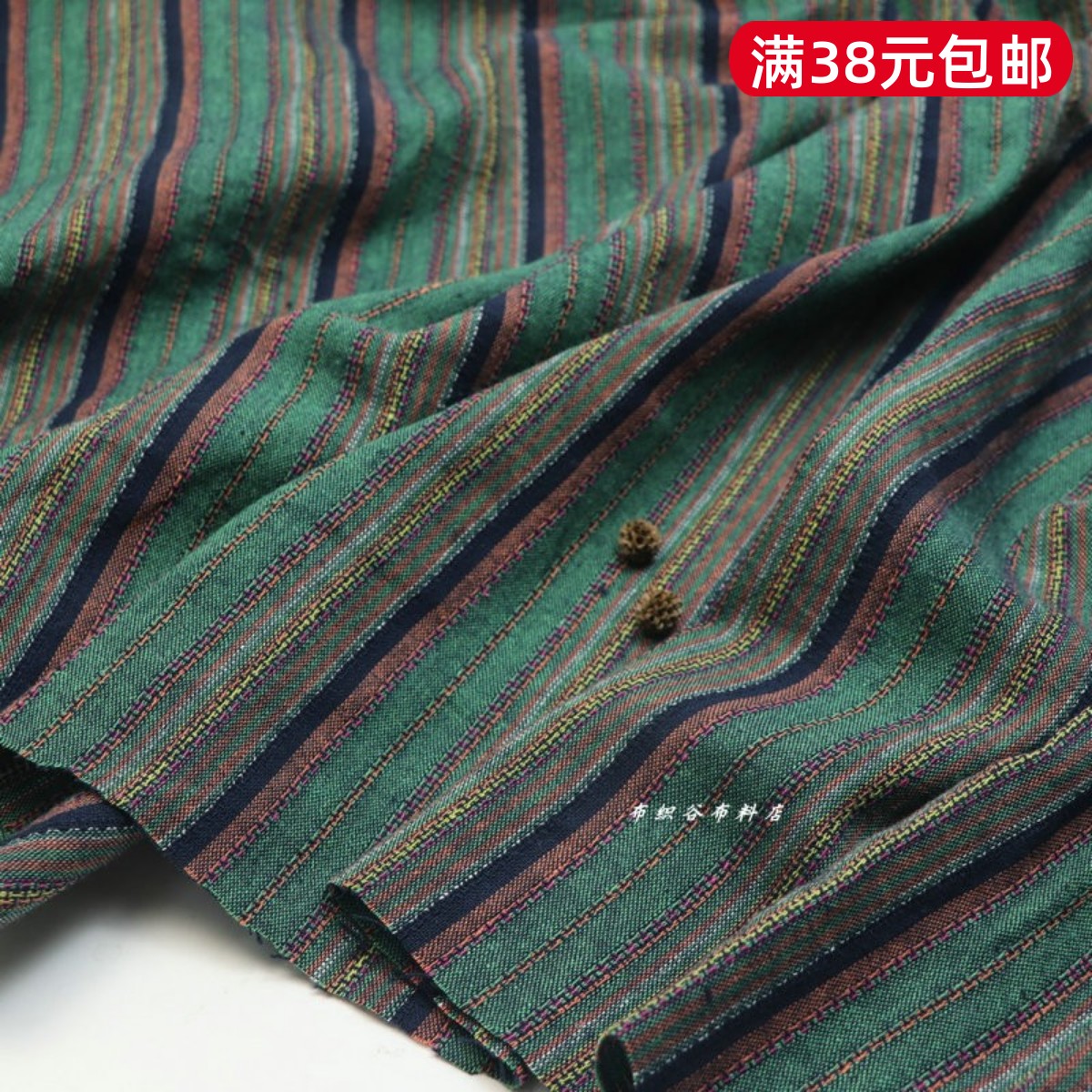 复古绿色条纹棉涤麻服装布料图片