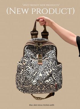 大容量旅行双肩包女2025新款时尚牛津布女士背包动感漫画妈咪包