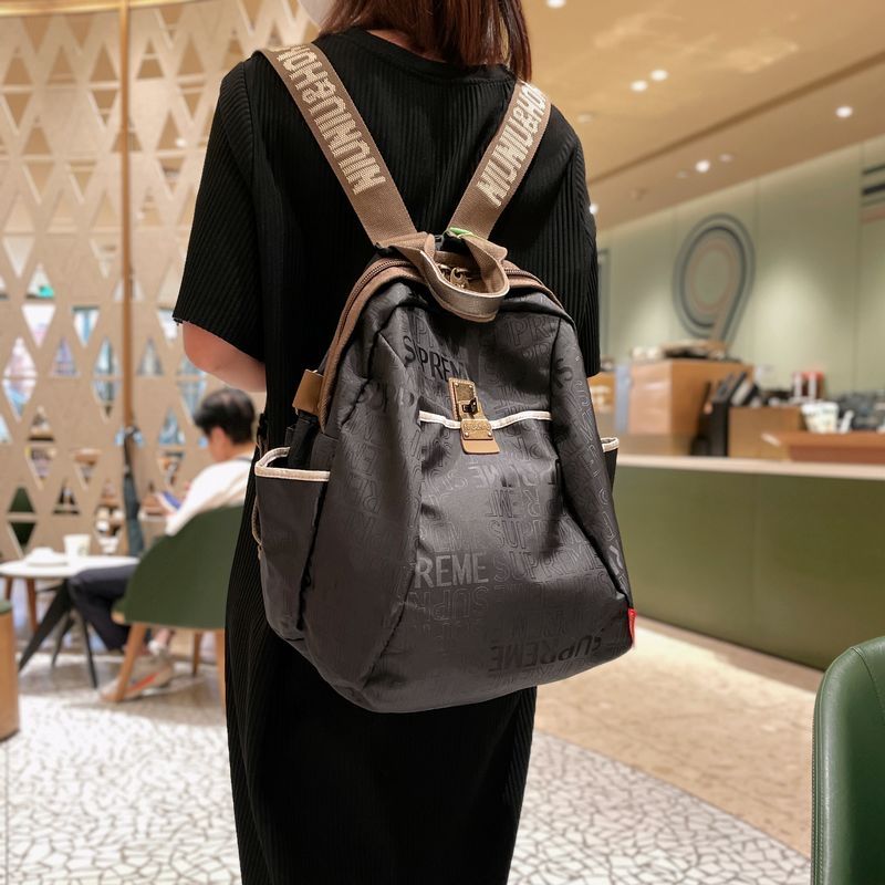 洋气防水旅行双肩包女2025新款时尚登山包女士背包牛津布休闲旅游
