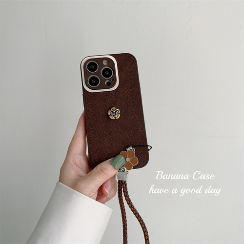 iPhone17水泥纹深棕色山茶花硬壳