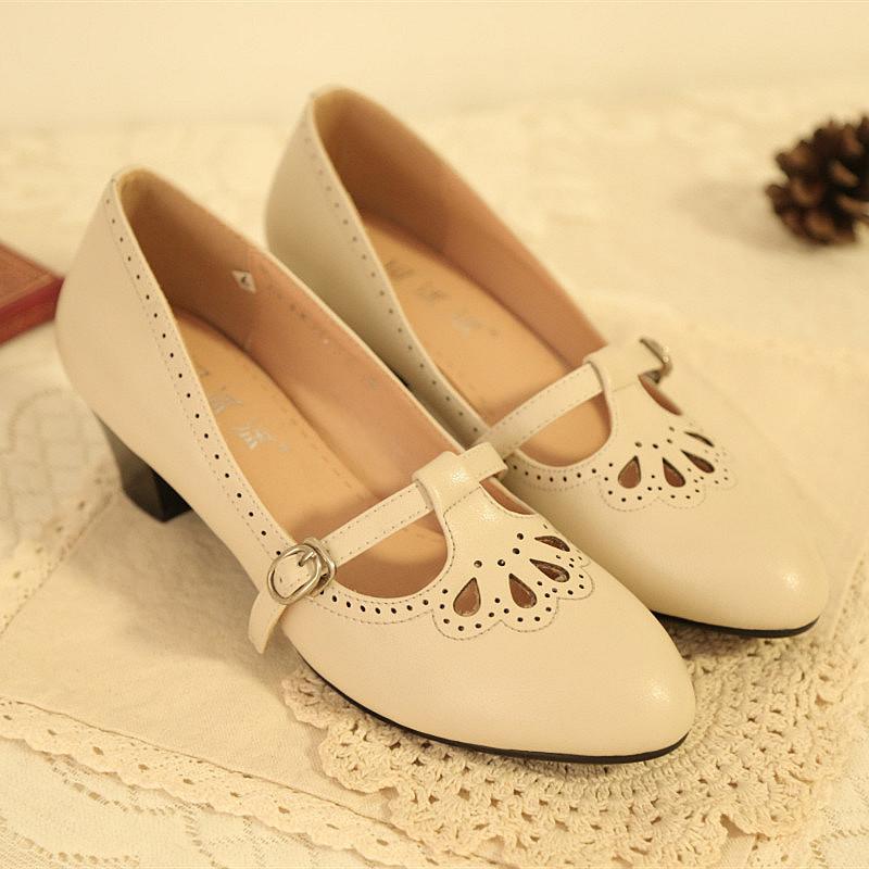 甜美淑女镂空雕花真皮中跟单鞋