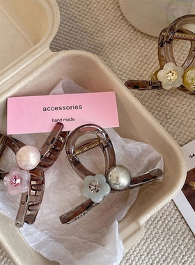 春夏亚克力花朵抓夹2025新款发夹女高级感后脑勺盘发鲨鱼夹子发饰