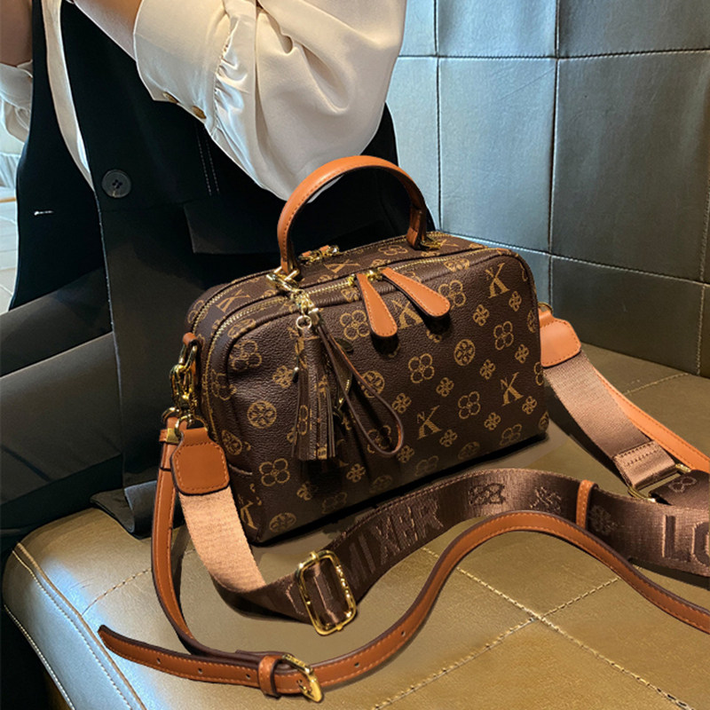 正品真皮女包2025新款春夏百搭休闲手提单肩斜挎包时尚高级枕头包