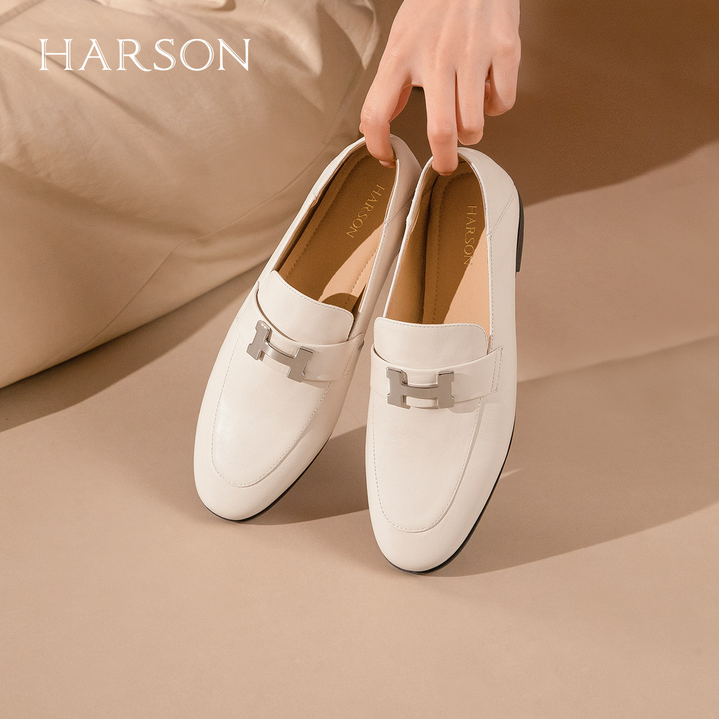 哈森H金属饰扣真皮乐福鞋女圆头一脚蹬简约皮鞋2026新款HWS2
