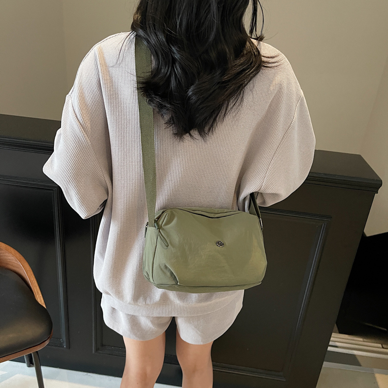 红鹮鸟小包包2025ins时尚单肩包轻便休闲骑行男女同款斜挎