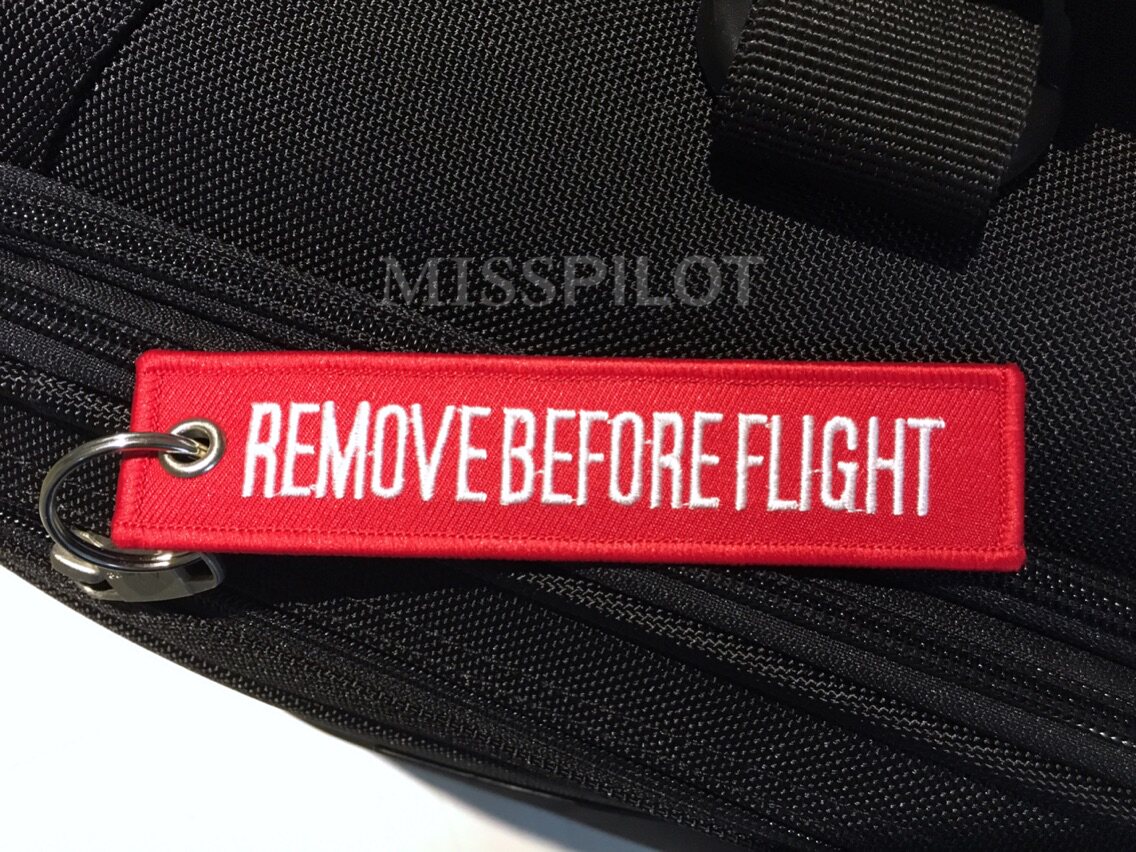 Please Remove the keychain, bag hanger and luggage tag before the flight thumbnail 3