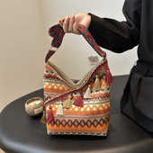 大容量民族风宽带斜挎包2024网红单肩流苏包手工编织通勤托特包女