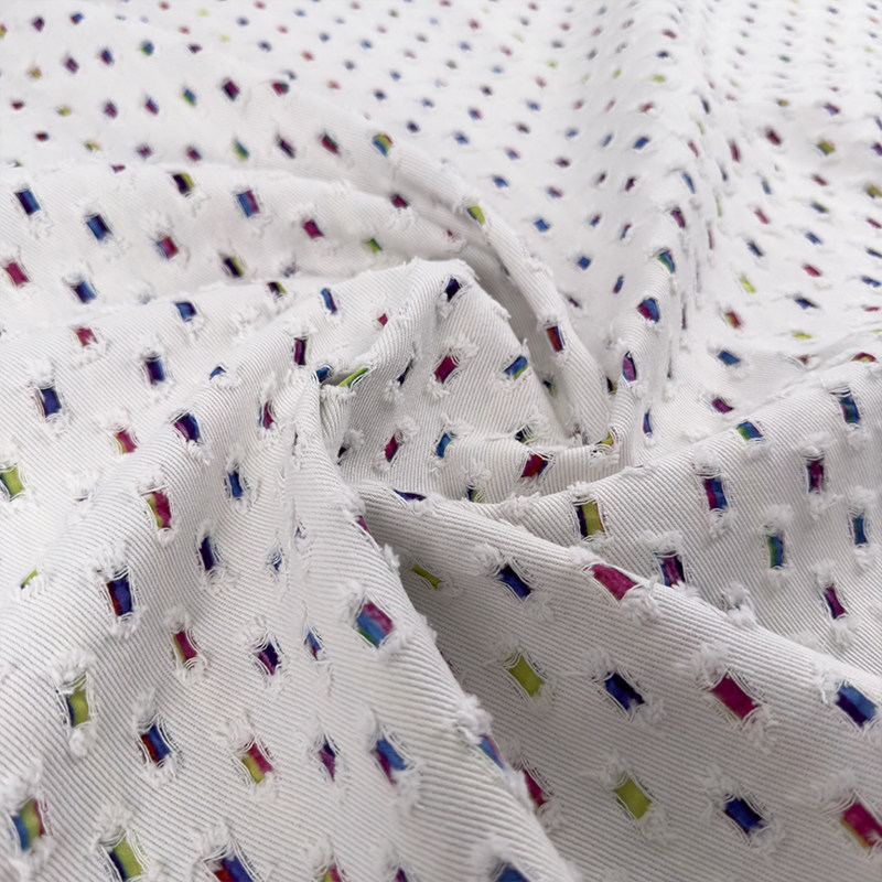 白色破洞纯棉面料服装设计师布料