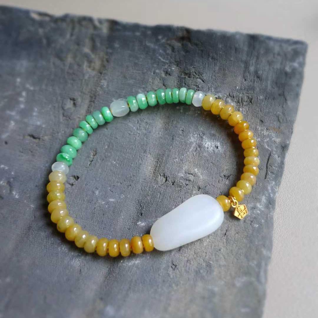 和田独籽翡翠黄加绿手串