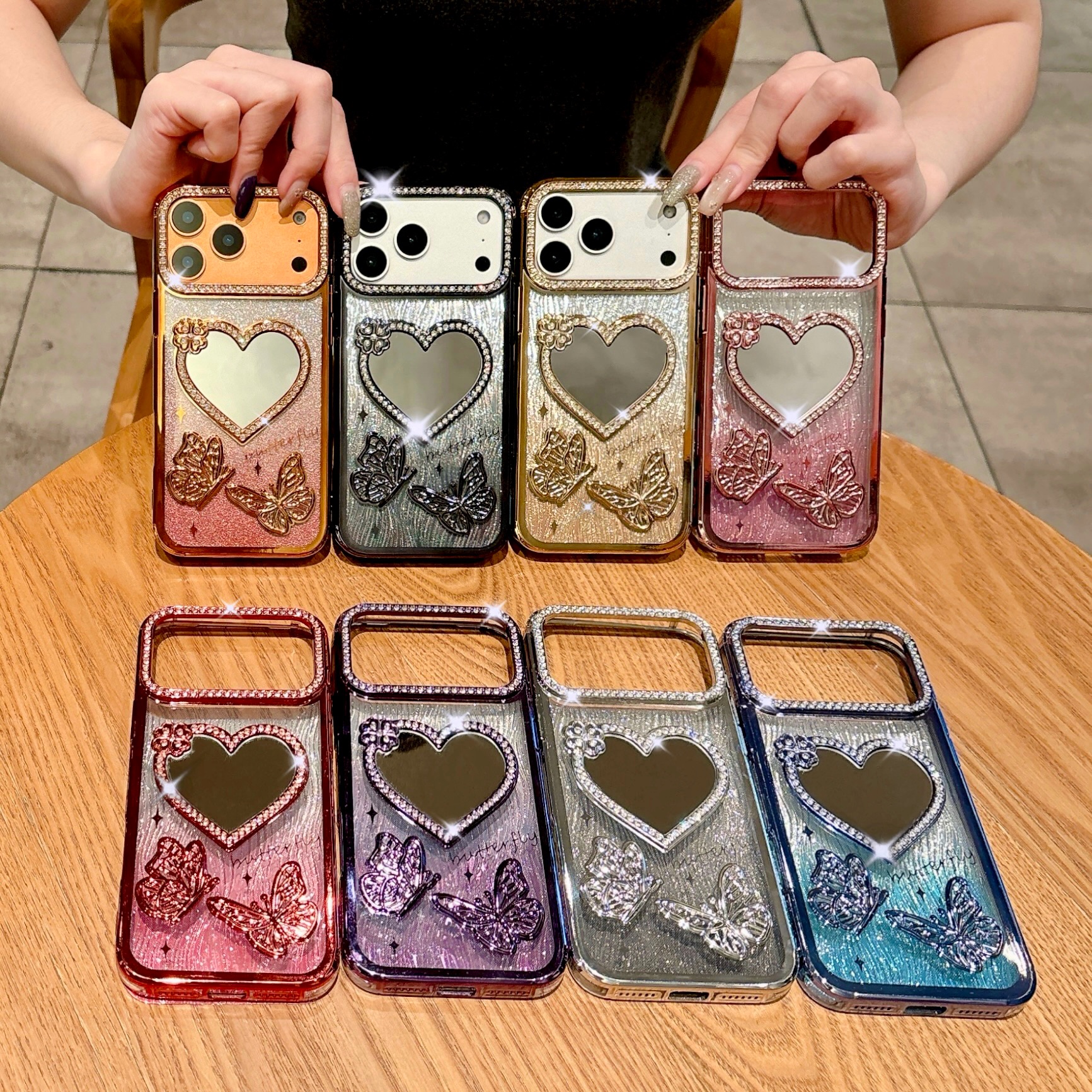 适用苹果17pro max爱心镜子电镀钻边水波纹闪粉手机壳iPhone16pro蝴蝶透明15 14 13 12 11防摔Air保护套批发