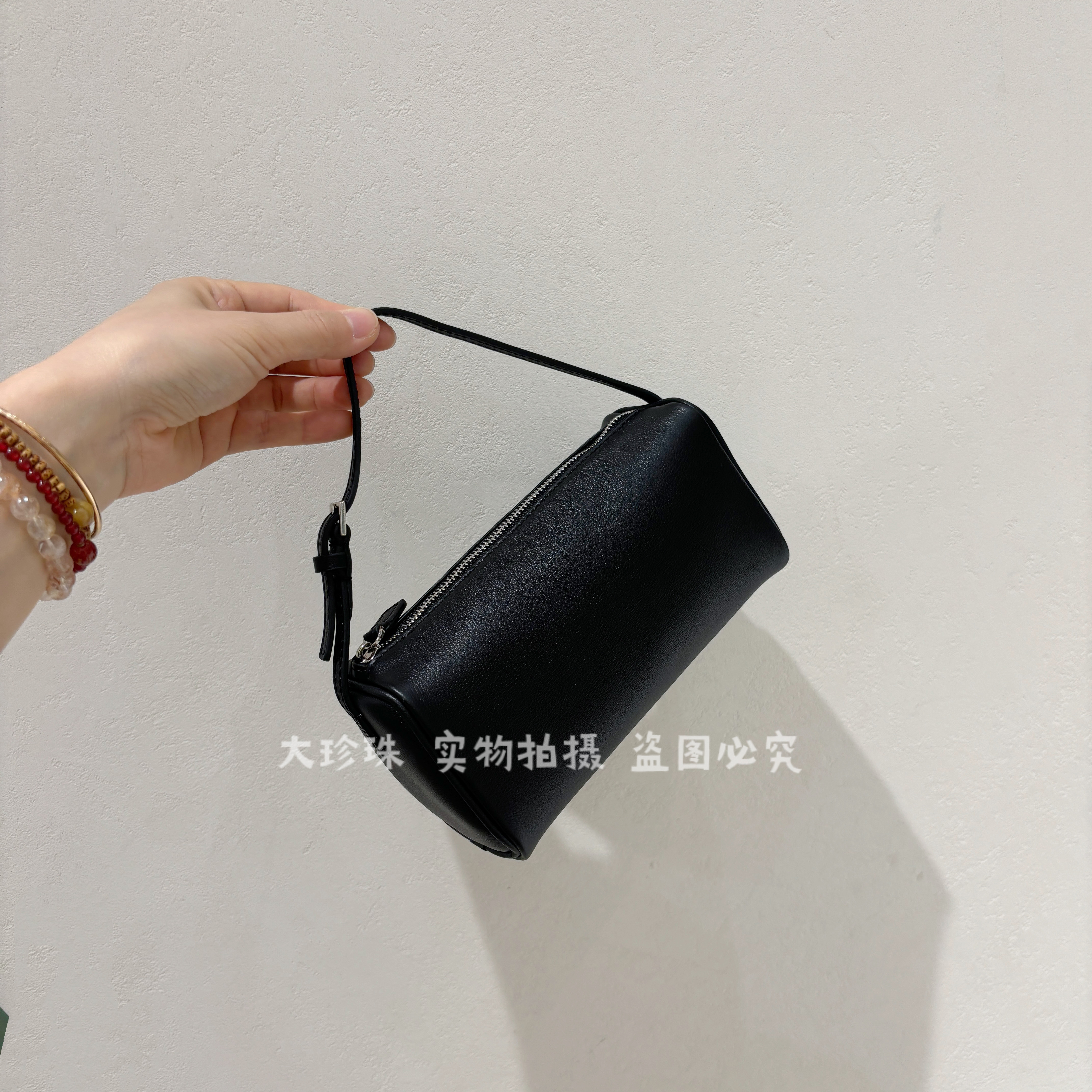 row系极简主义mini笔筒包手拎包斜挎包2026新款真皮波点圆筒包