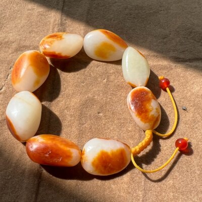 80g天然玉龙河新疆和田籽料原石 红皮白肉和田玉独籽红皮手串手链