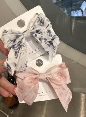 521207韩国东大门Baket时尚甜美碎花蝴蝶结鸭嘴夹发夹