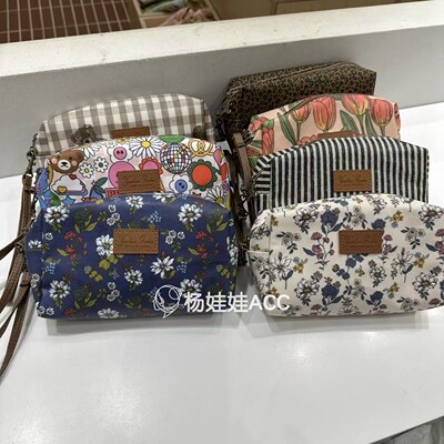 552018韩国东大门wing新款防水面料卡通花手拿包收纳包（带提手）