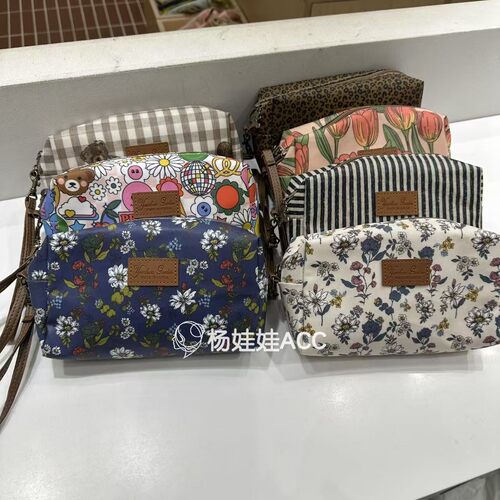 552018韩国东大门wing新款防水面料卡通花手拿包收纳包（带提手）