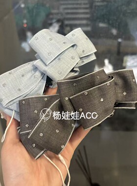 642703韩国东大门Baket新款高级感甜美蝴蝶结布艺满天星香蕉夹