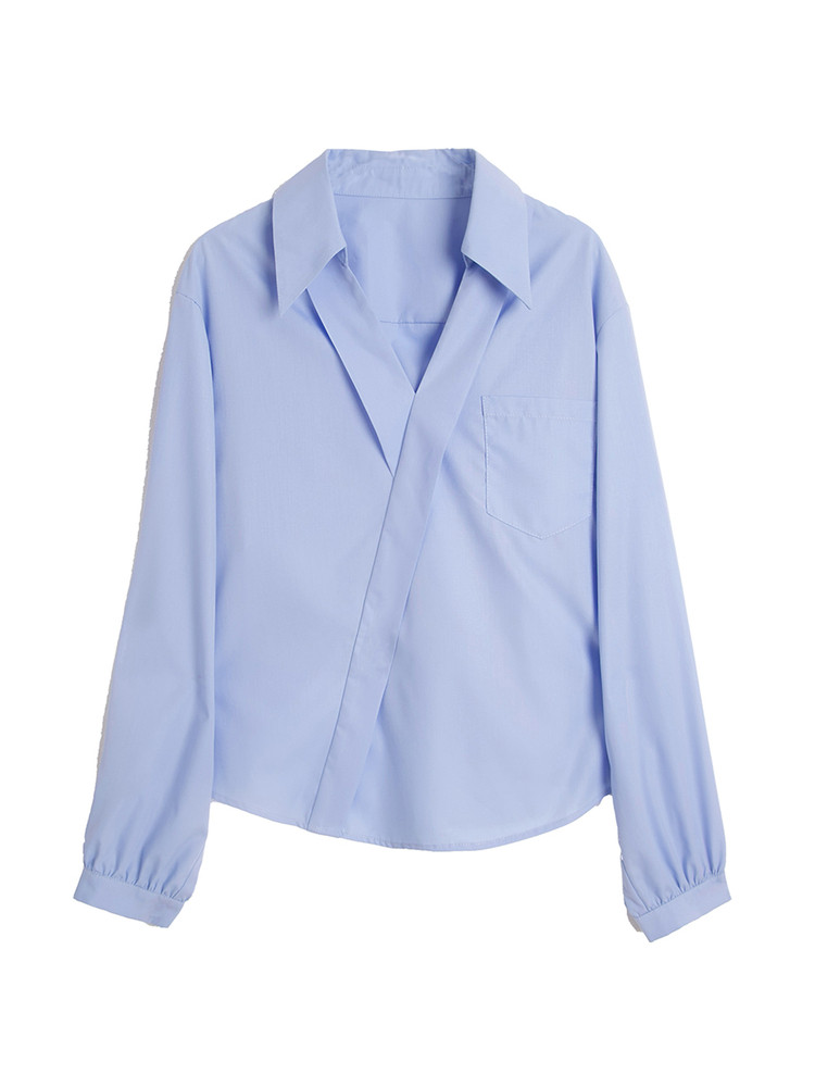 Light blue long-sleeve collared shirt laid flat on a white background