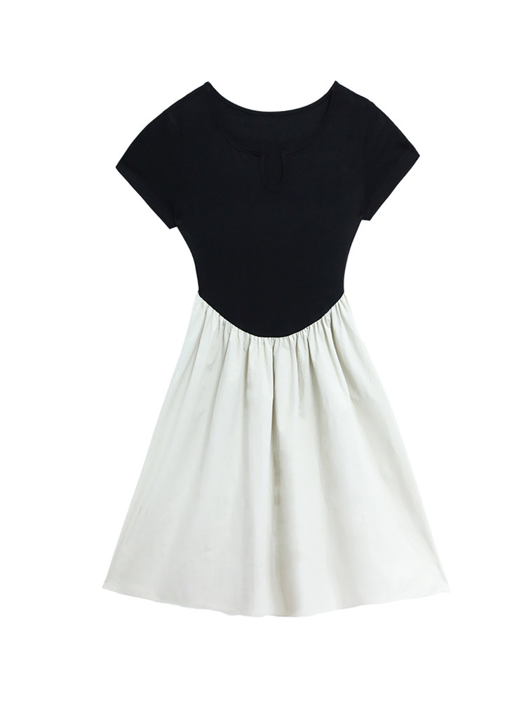 Black-and-white short-sleeve dress laid flat on a white background