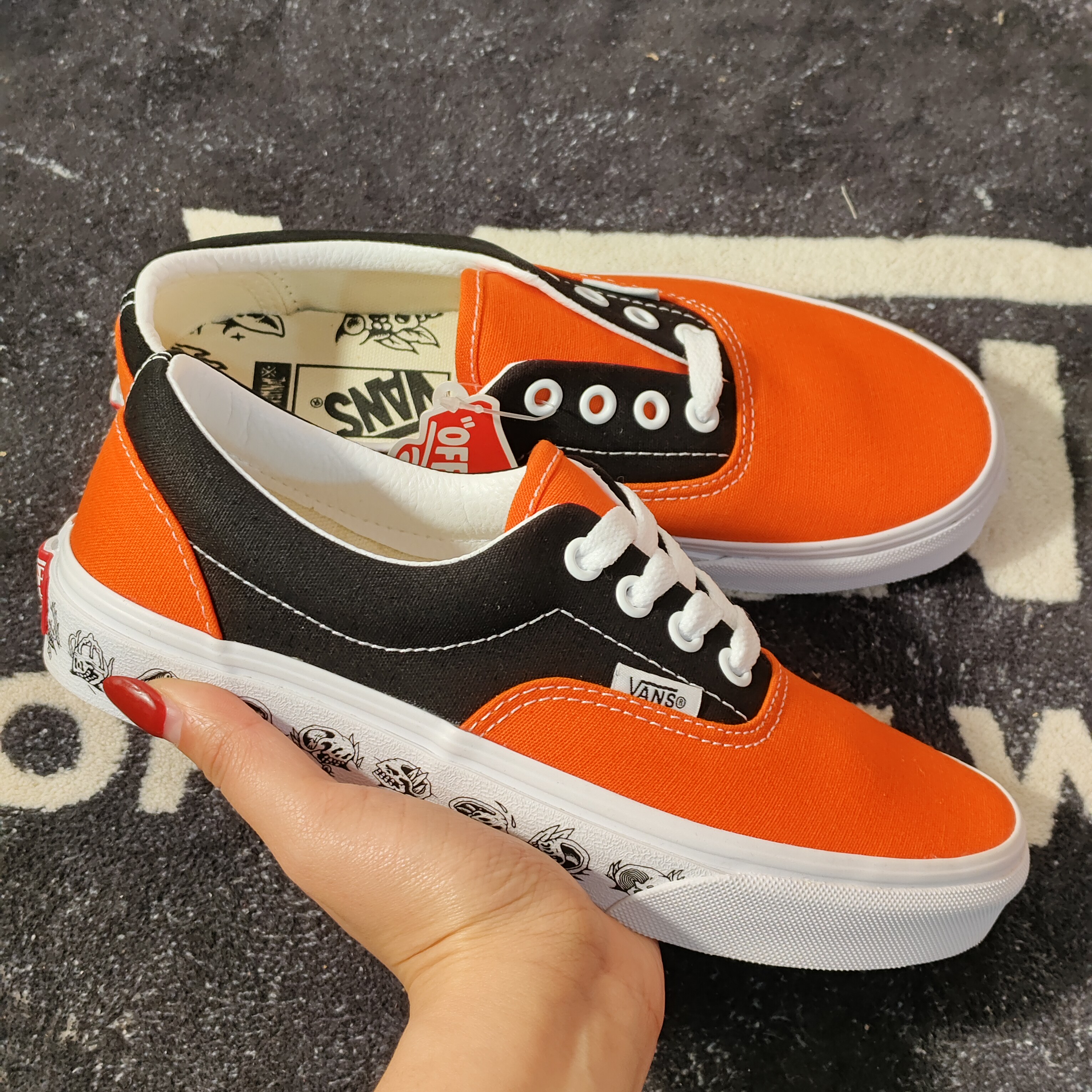 Vans Era橙黑拼色骷髅印花低帮板鞋 VN0A38FRT5M