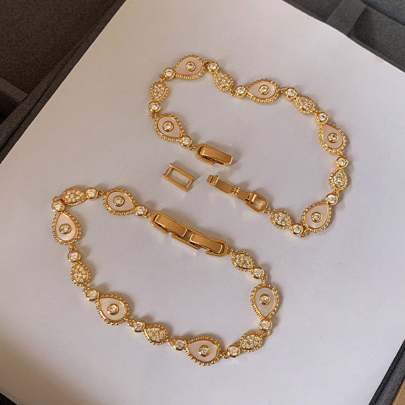 天然白贝母复古金色锆石叠戴手链女新款轻奢小众精致闺蜜手串手饰