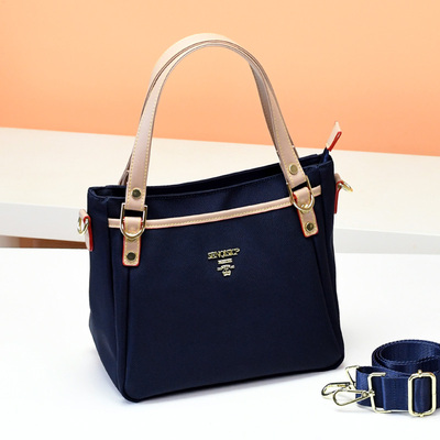 多层撞色竖款时尚风防水单肩包包