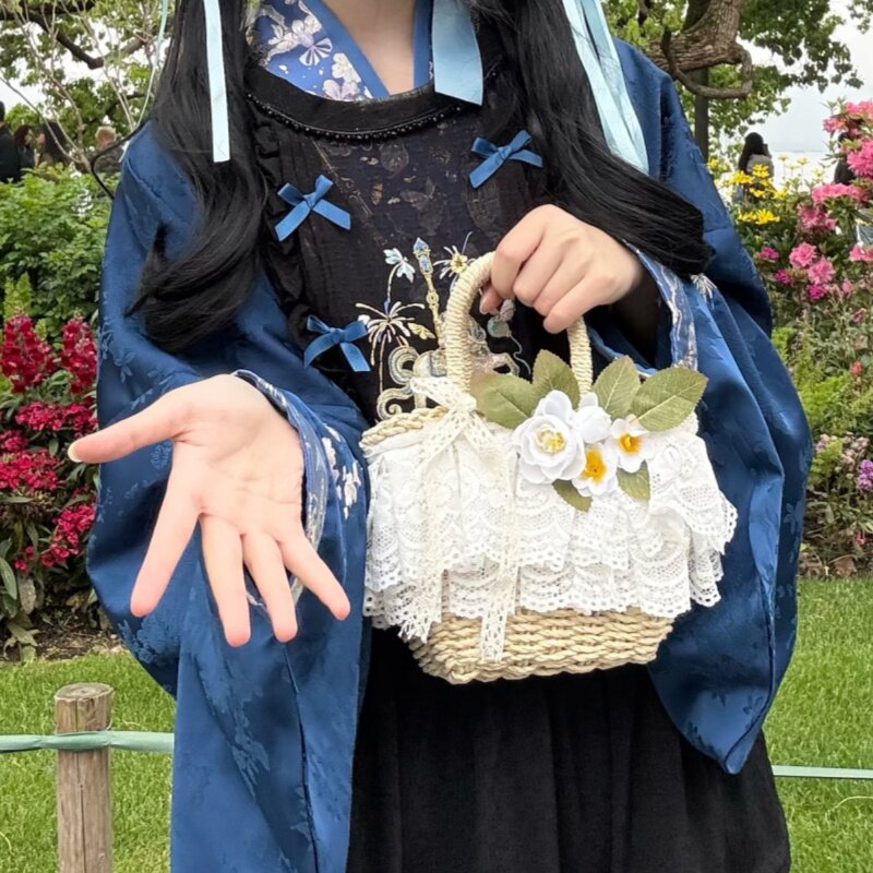 小清新田园蕾丝蝴蝶结编织包图片