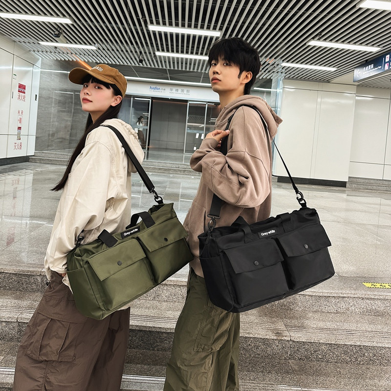 旅行包男女手提大容量旅游出差轻便收纳短途运动健身包学生行李袋