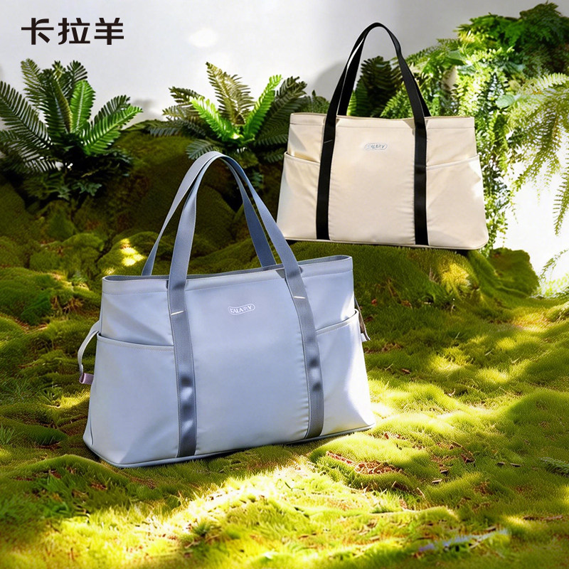 卡拉羊旅行包大容量防水收纳包可插拉杆打包袋男健身运动托特包女