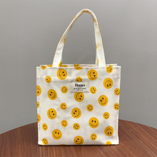 韩国进口DAMS可爱治愈笑脸防水拉链饭盒便当袋手提包手提袋女新款