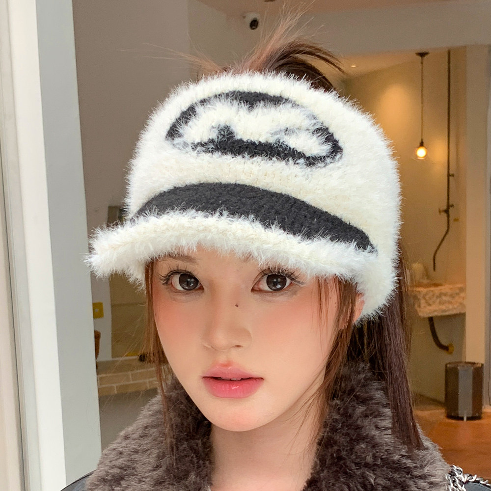冬天女款扎马尾空顶帽保暖加厚防寒户外时尚帽子针织毛绒新款护耳图片