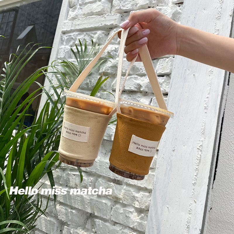 每天一杯快乐起飞 原创帆布奶茶袋手拎咖啡袋水杯套袋