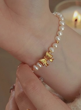 小公主。天然淡水珍珠S925纯银镀金蝴蝶结简约高级感弹力绳手链