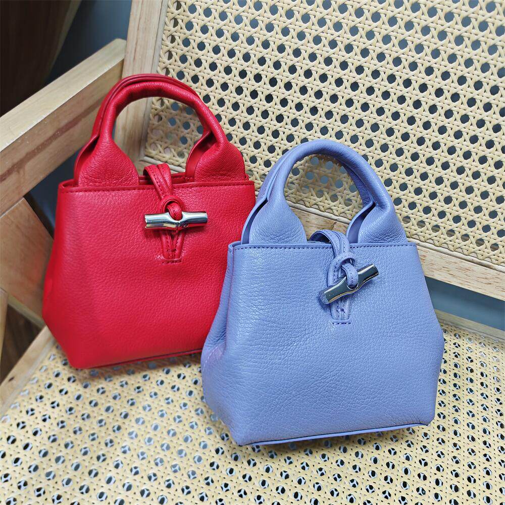 头层牛皮手提斜挎真皮进口牛皮日韩个性百搭水桶2026单肩女士小包