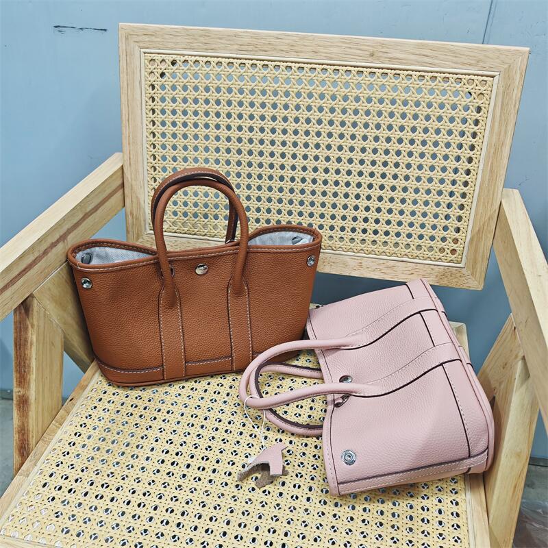 2025早春新款手提花园包荔枝纹头层牛皮单肩斜挎手提真皮水桶女包