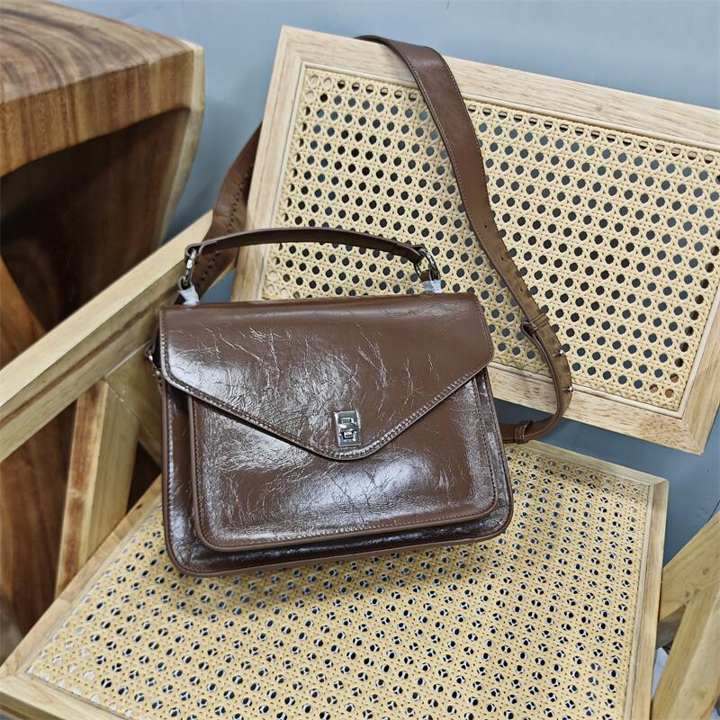 真皮大容量油差百搭单肩女包