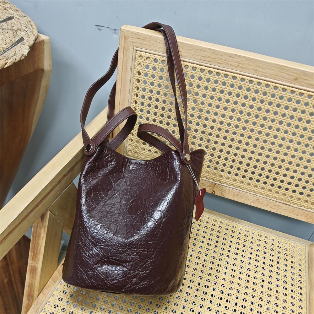 特价处理真皮水桶子母清货女士包