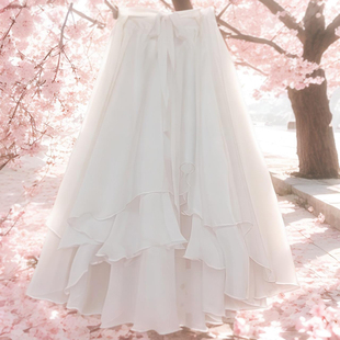 早春盐系穿搭白色多层次蝴蝶绑带燕尾百褶风情万种的长款半身裙子