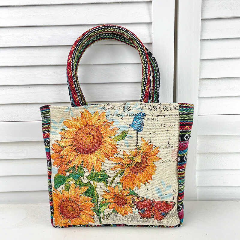 高颜值双面刺绣帆手提包高档民族风买菜通勤零钱手机包复古便当包