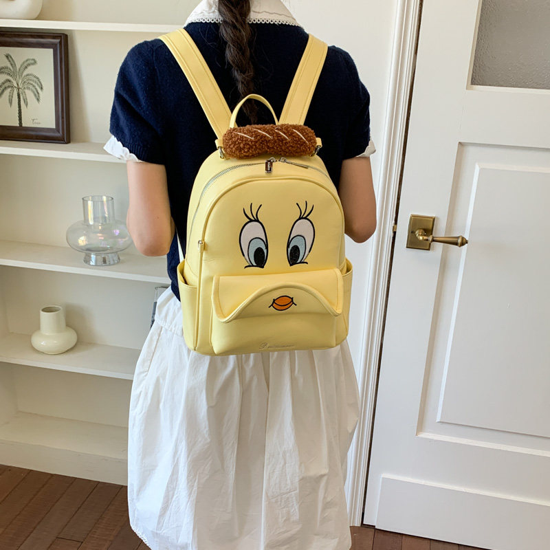 可爱卡通黄色大容量女学生双肩包