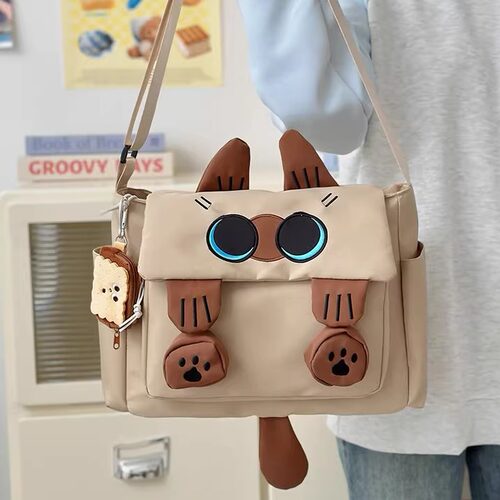 可爱卡通猫咪书包女初中生小众设计小背包女生大学生高中生斜挎包