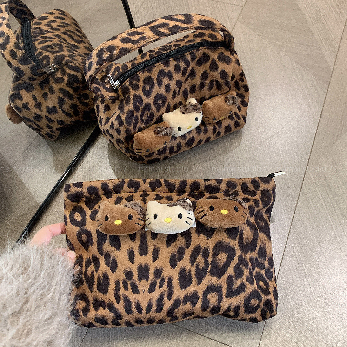 豹纹黑皮KT包包~收纳大容量手提包化妆包旅行随身便携洗漱零钱包