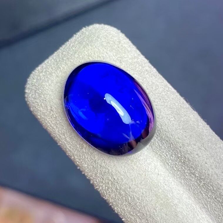 15.55ct天然全净蛋面坦桑石椭圆形裸石DIY设计珠宝5A蓝色荧光宝石