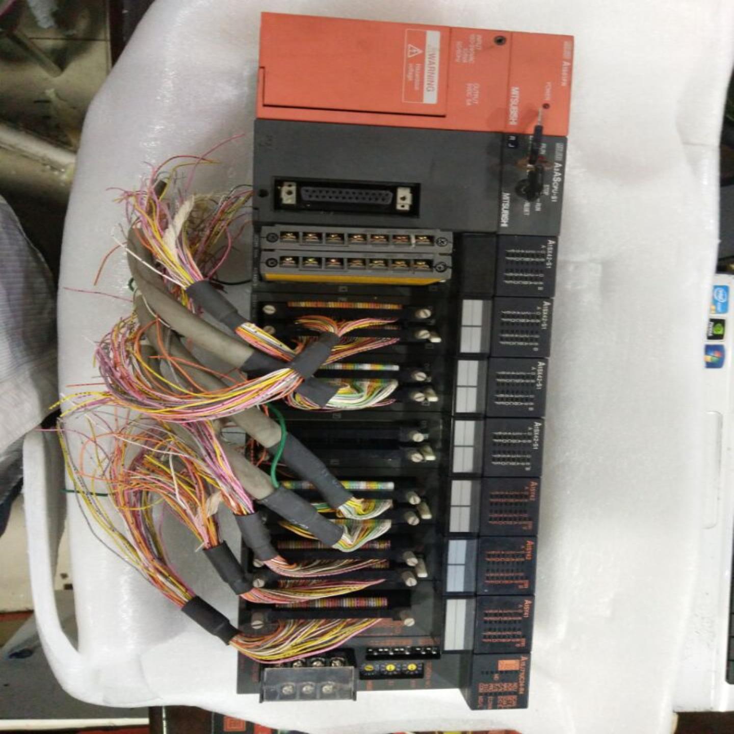 处理原装三菱 A 系列 PLC 型号 A1SX42S1 编程器假一赔十现货询价