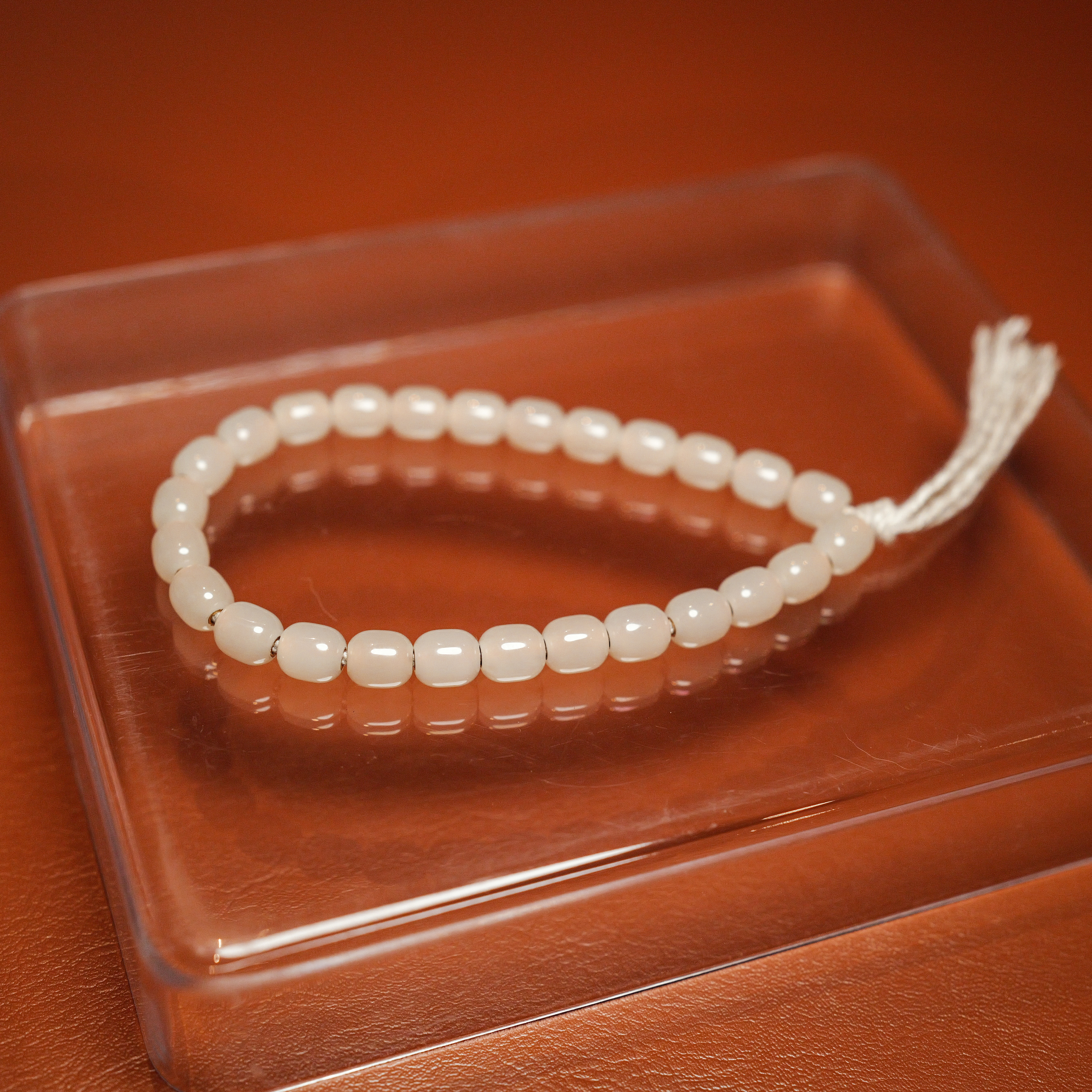 秋会长的和田玉原创胶囊珠手持