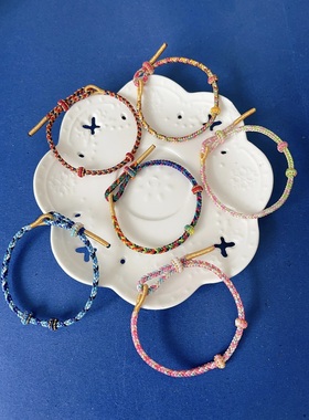 端午节宝宝编织手绳粽子