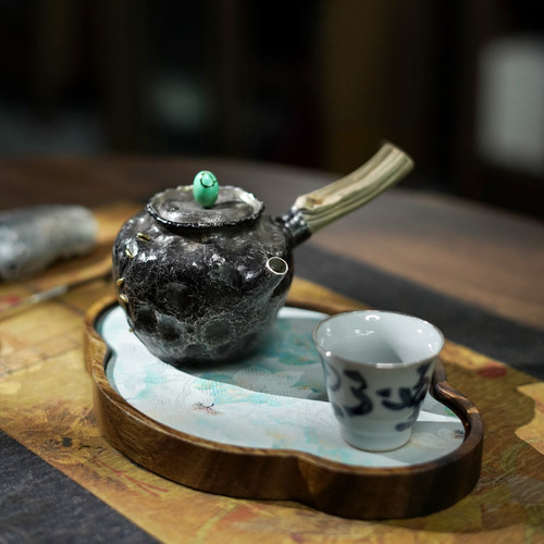 纯银999纯手工一张打侧把泡茶壶