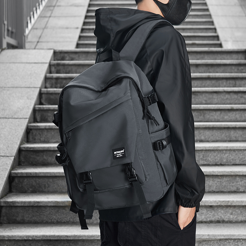 大容量双肩包男士男款旅行电脑背包2024新款休闲墨绿色大学生书包