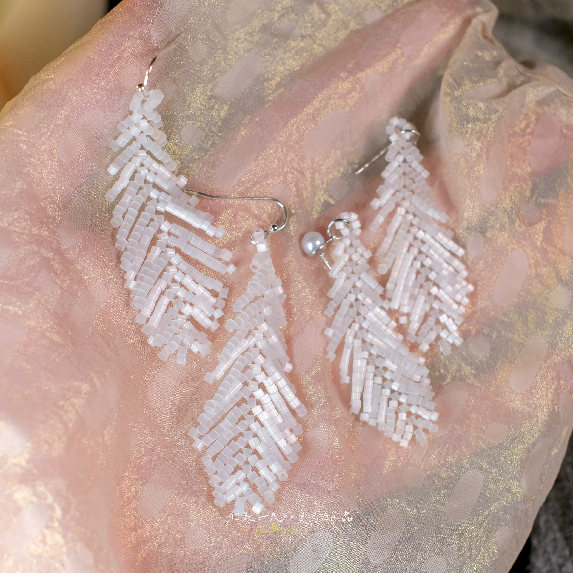 《云之羽》仙气夏天白色米珠羽毛夸张度假清冷感流苏耳环耳夹耳饰